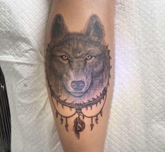 Reddit users noticed something odd about this woman's wolf tattoo - can you spot it?