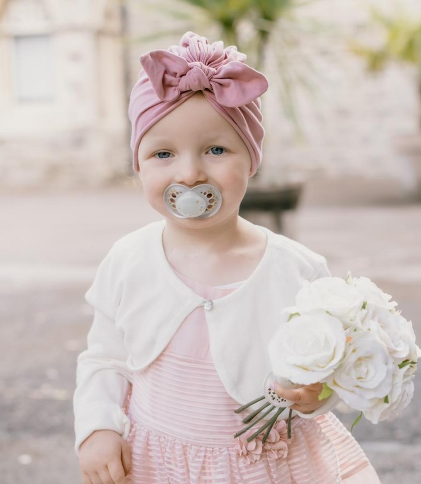 Megan was put onto an 18-month chemotherapy course. She is pictured at her parents wedding, in May 2021