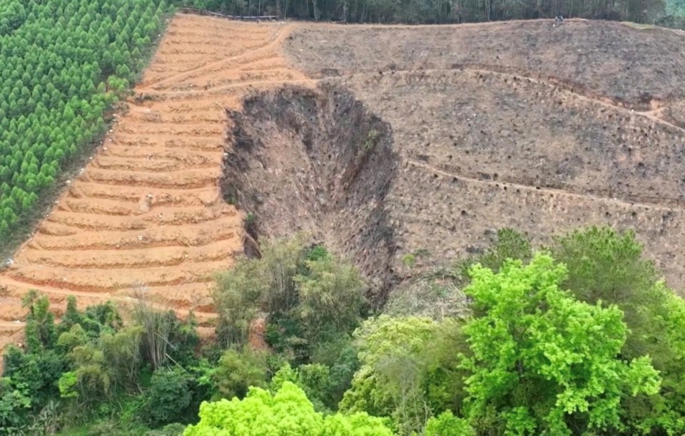 The crater left after the China Eastern Airlines jet slammed into the hillside