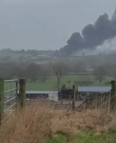 Witnesses described seeing giant plumes of thick dark smoke near the scene