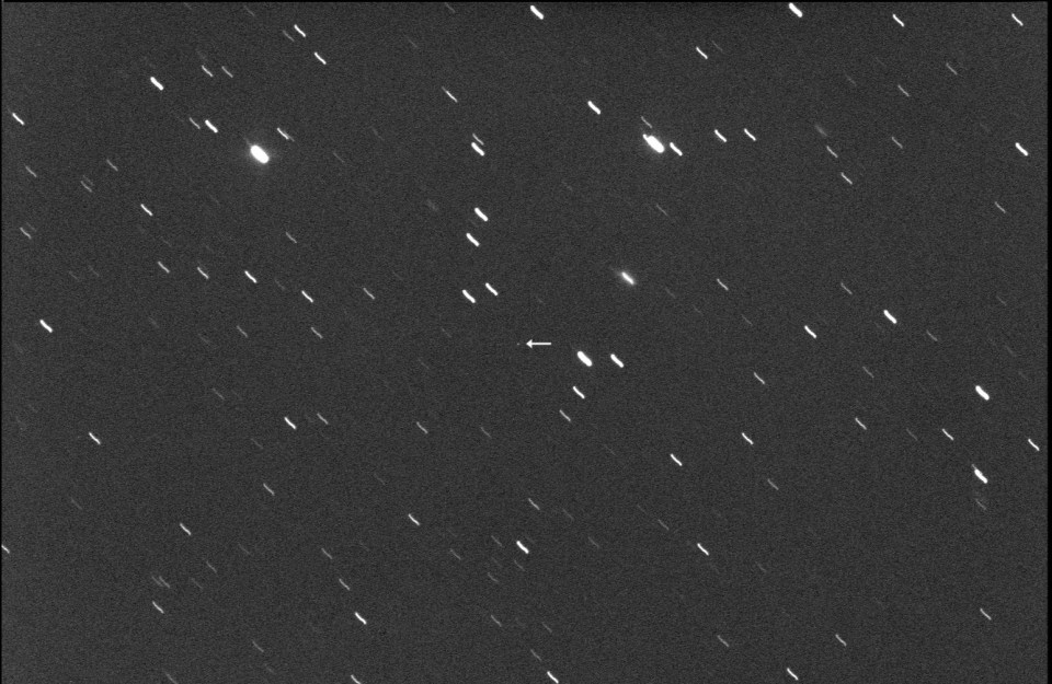 Asteroid 2007 FF1 is highlighted in the image above by a white arrow