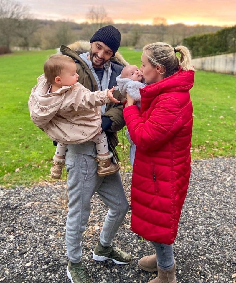 Tom leaves behind his wife, Kelsey, and their two children, Aurelia, two, and Bodhi, one. They are pictured in January 2021, a few months after his brain tumour diagnosis