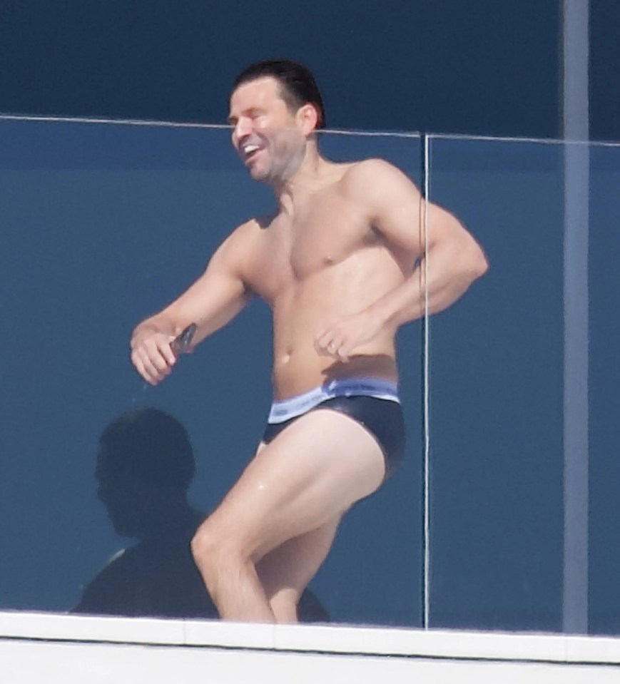 The TV star showed off his ripped figure on the balcony of his luxury villa