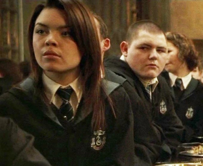 Scarlett Byrne as Pansy Parkinson in Harry Potter alongside Jamie Waylett as Crabbe