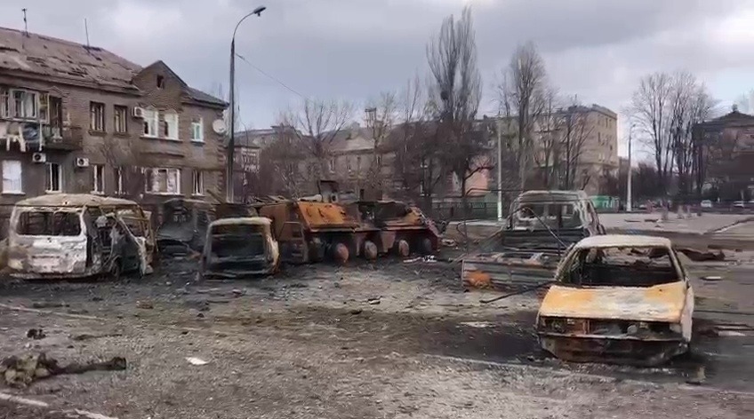 Destroyed buildings and vehicles after Russian attacks in Mariupol