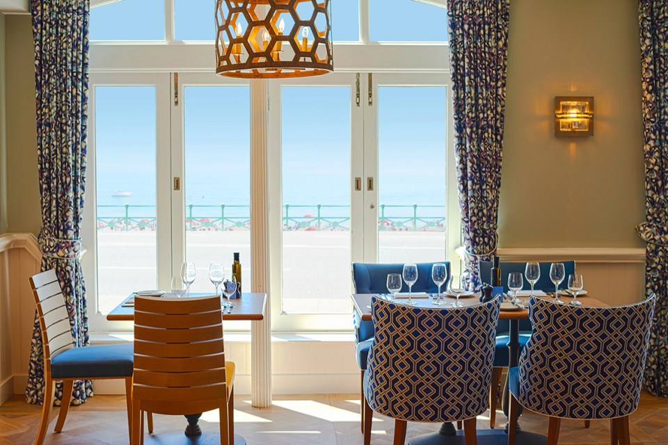 The hotel is decorated to a seaside theme with white-washed wooden walls and blue furniture