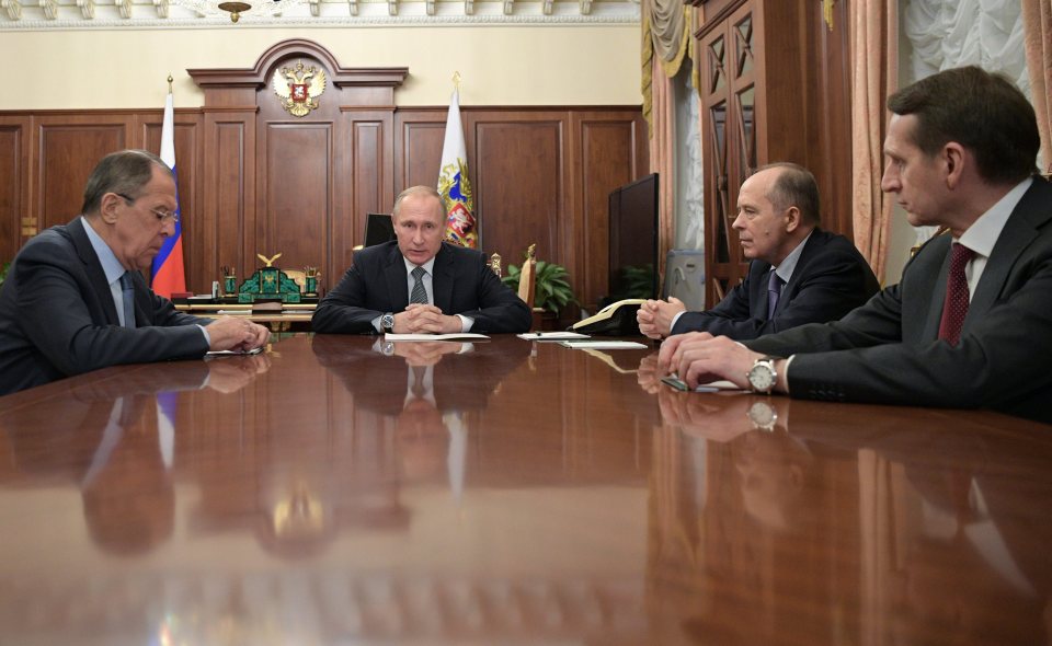 Putin with former spymaster Bortnikov (second right)