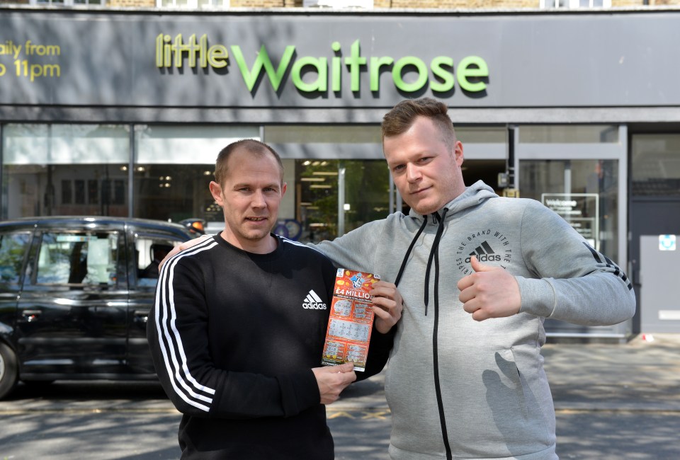 Mark Goodram and Jon Watson outside the store where they bought a winning scratchcard