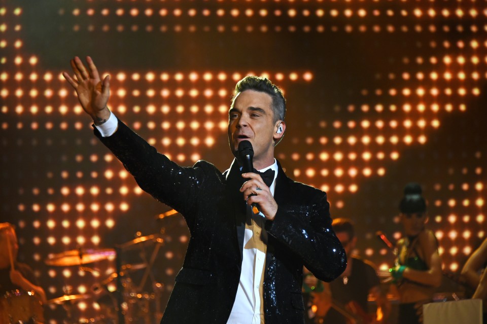 Robbie Williams is recording a new greatest hits album with an orchestra and will tour this year