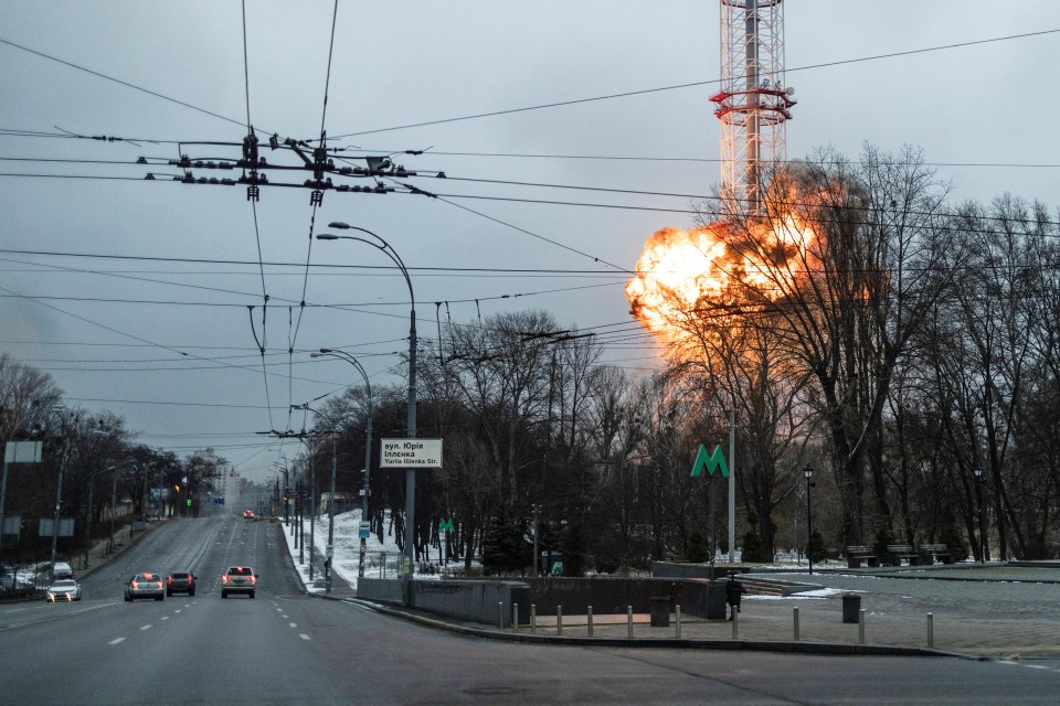 A blast is seen at one of the main TV towers in Kyiv