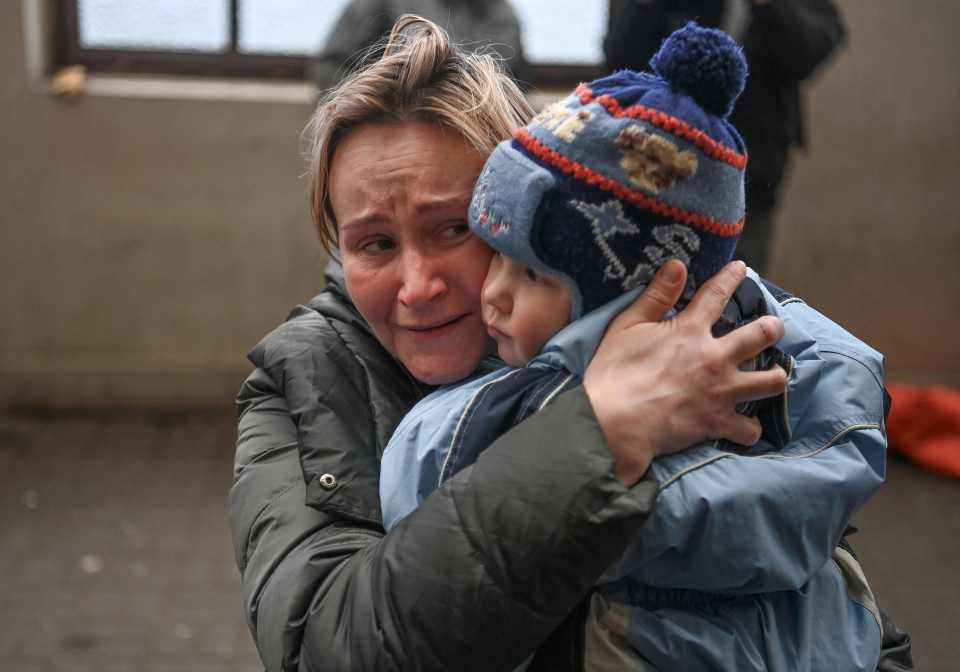 Hungary, Moldova, Slovakia and Romania have also welcomed refugees - a mother pictured with her young child in Poland