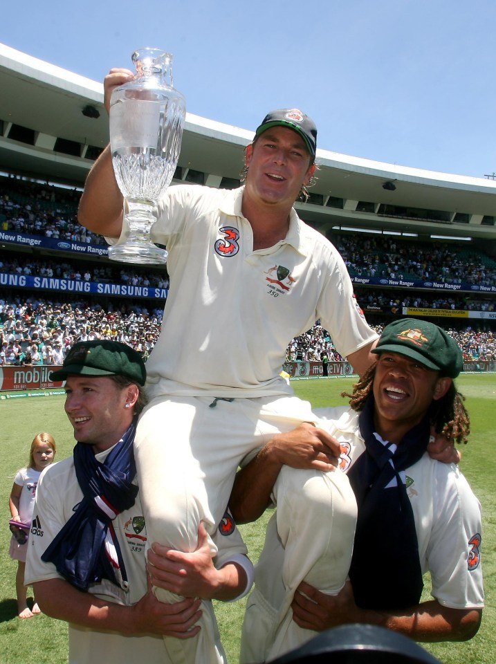 Shane Warne is carried around the field with the official Ashes Trophy by Michael Clarke and Andrew Symonds in 2007