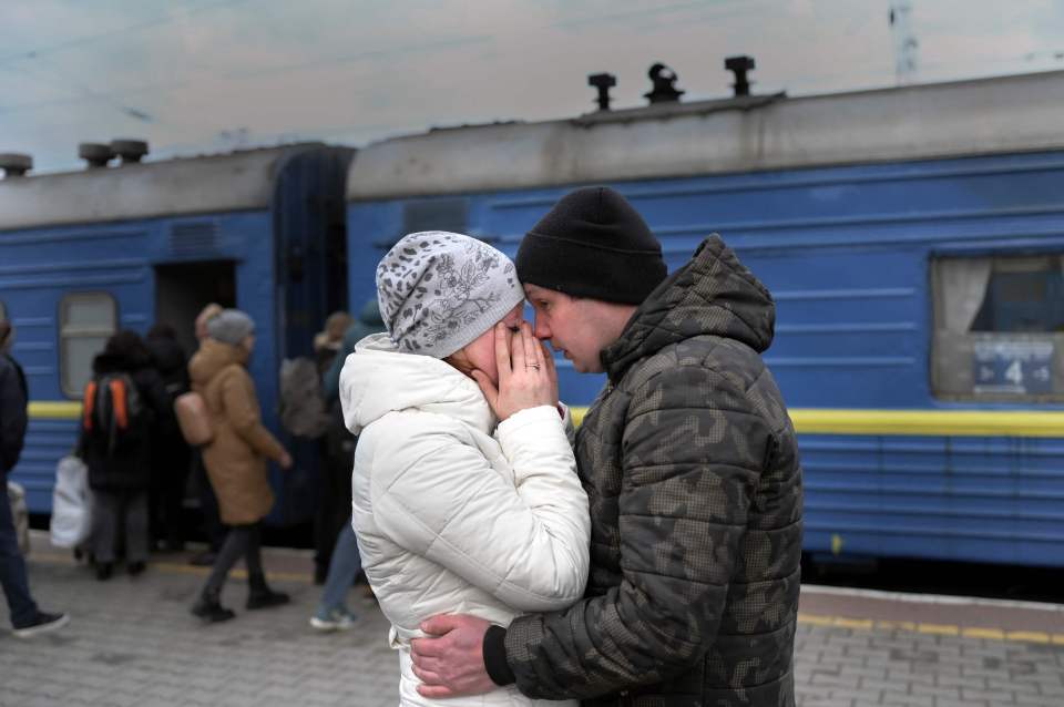 A couple say goodbye at the train station in Odessa