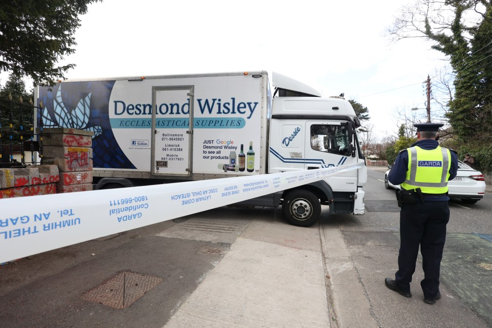 Police have arrested a man after a truck was rammed into the gates