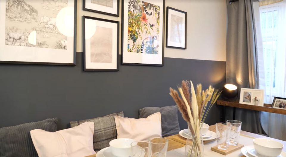 They turned the space into a stunning haven with warm tones and budget art