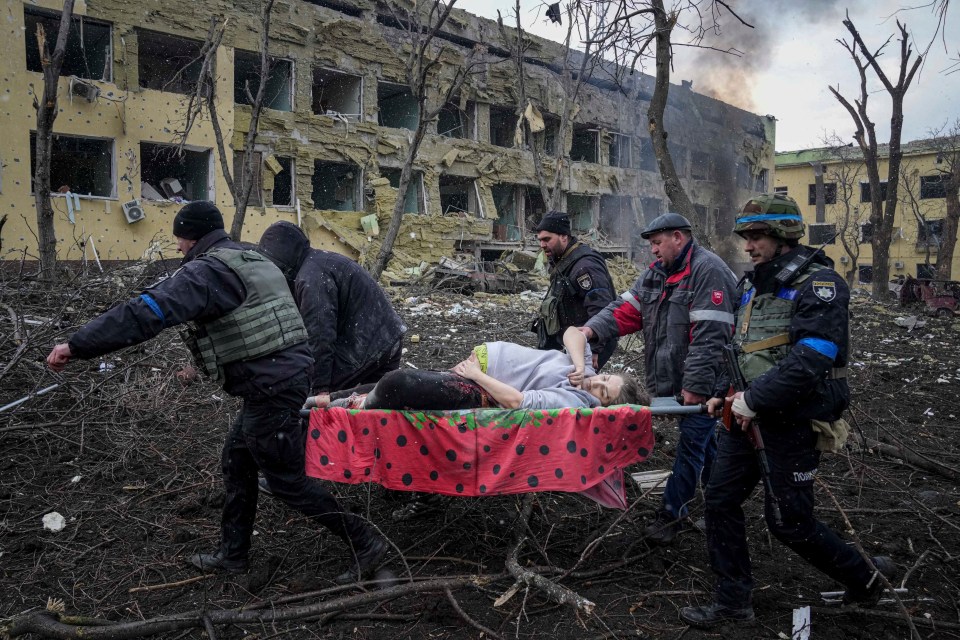 The pregnant woman pictured being stretchered from the hospital in Mariupol