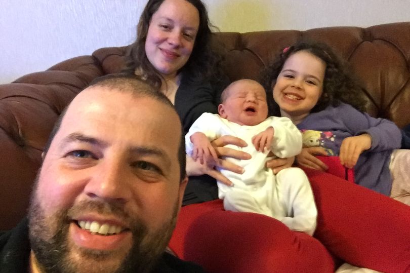 The Griffiths family with Pippa after she was born - she died at a day old