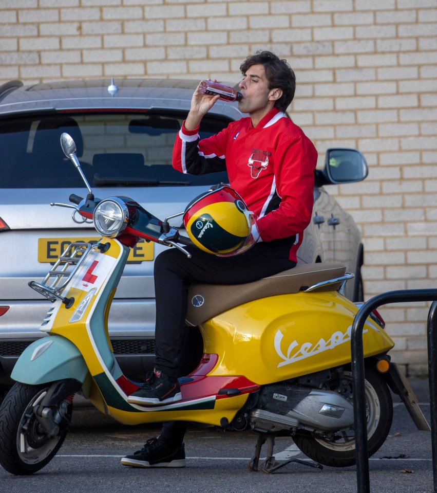 He's back on his moped again after refusing to drive it until he had lost weight