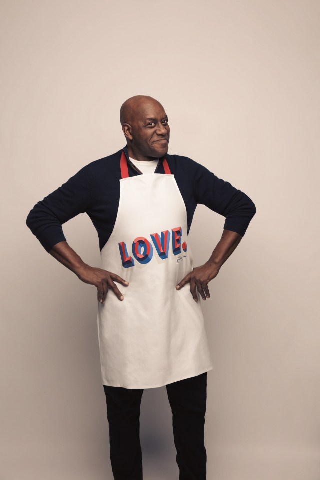 Ainsley Harriott sports an apron available in-store at Homesense and TK Maxx and online at tkmaxx.com to raise money for Comic Relief