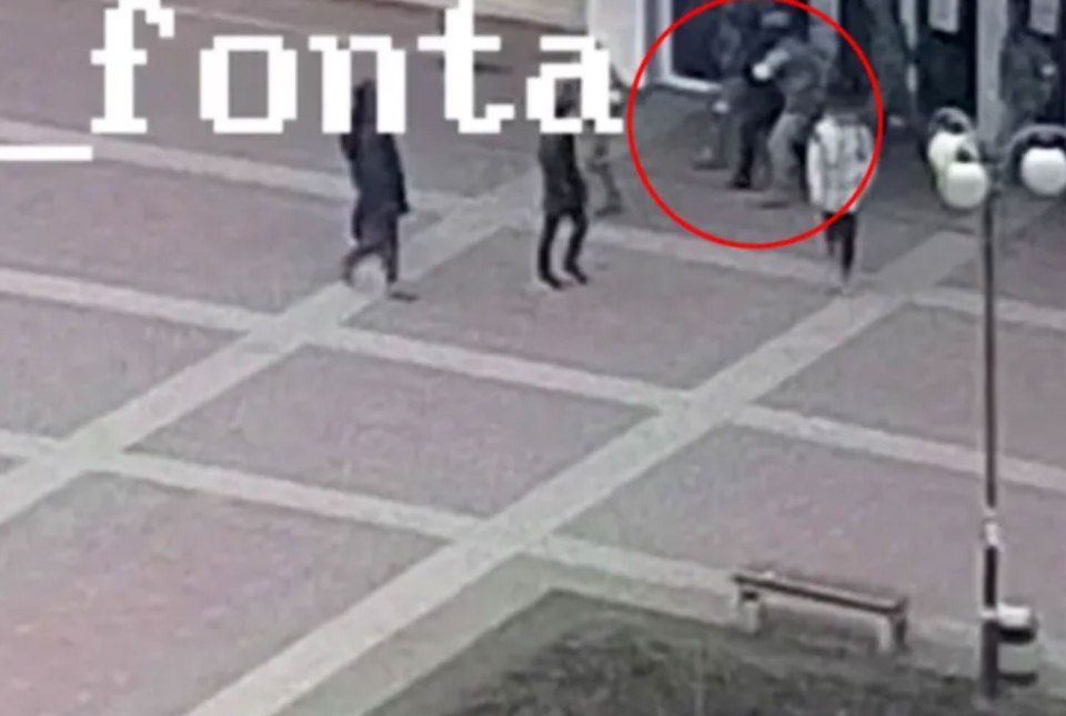 Footage shows the mayor being marched out of the building by Russian troops