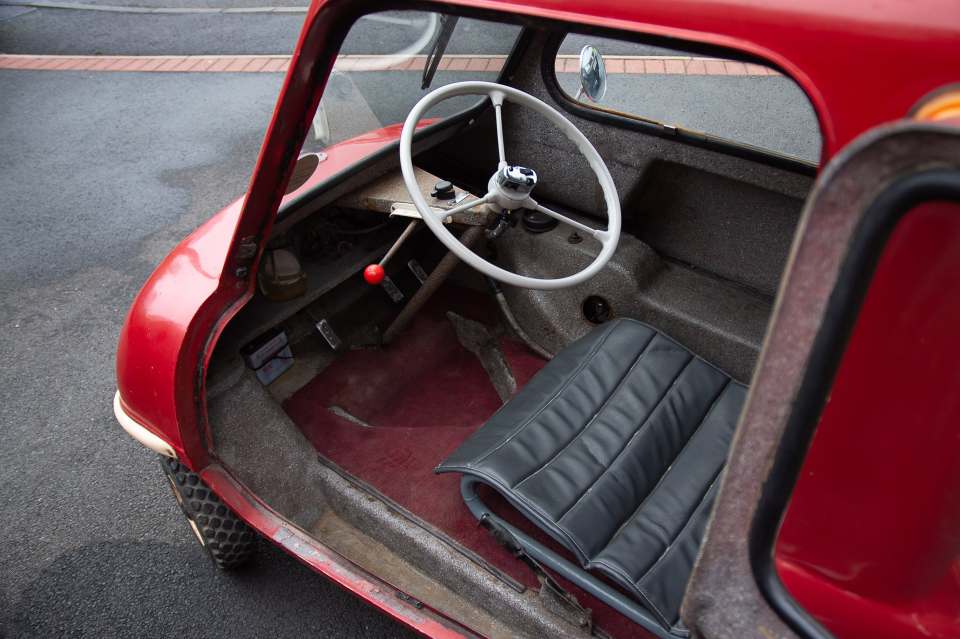 The Peel P50 micro-motor only has room for the driver and no reverse gear, so you have to get out and drag it backwards