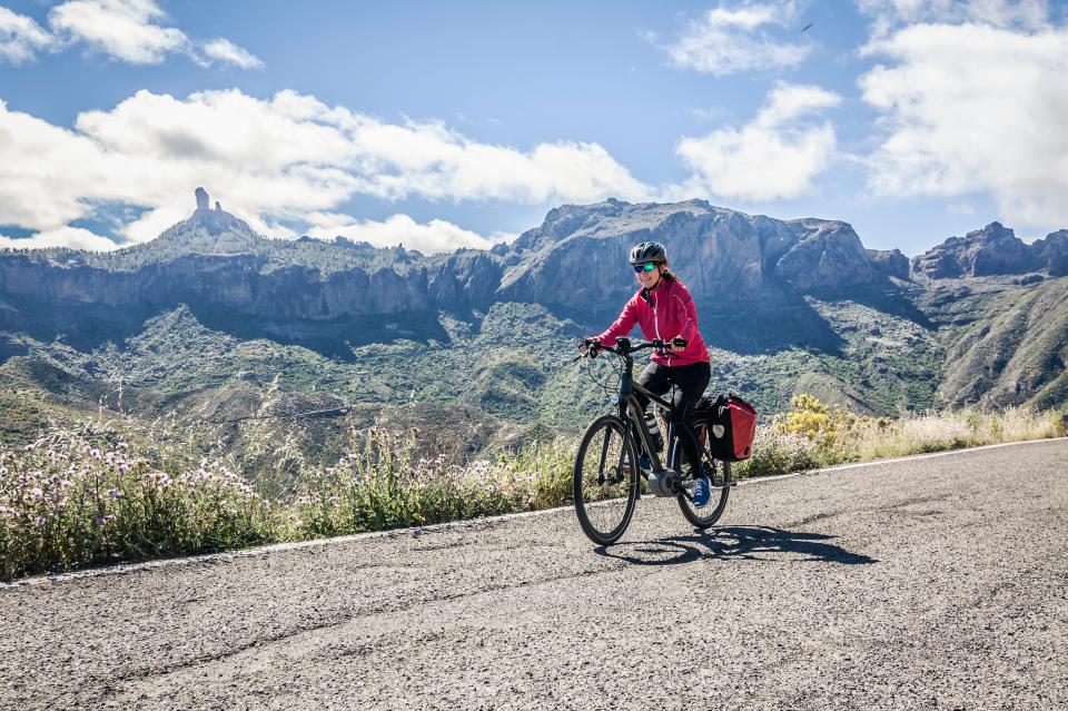 Soak up Spain’s beautiful winter sun in Gran Canaria, a visitor enjoys the stunning views on her electric bike