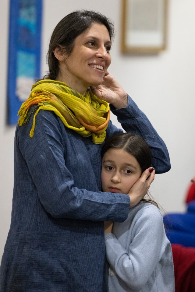 Nazanin holding her daughter Gabriella tight