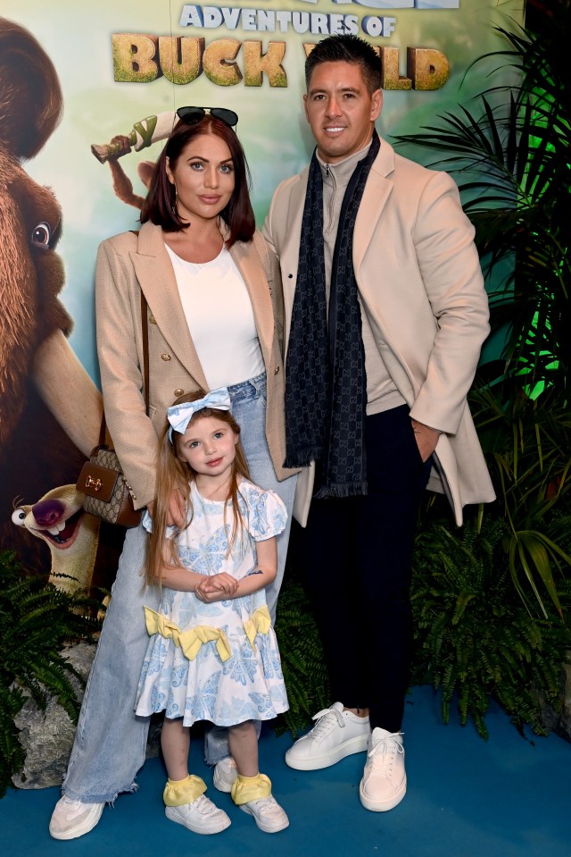 Amy looked stunning alongside Billy and her adorable daughter Polly