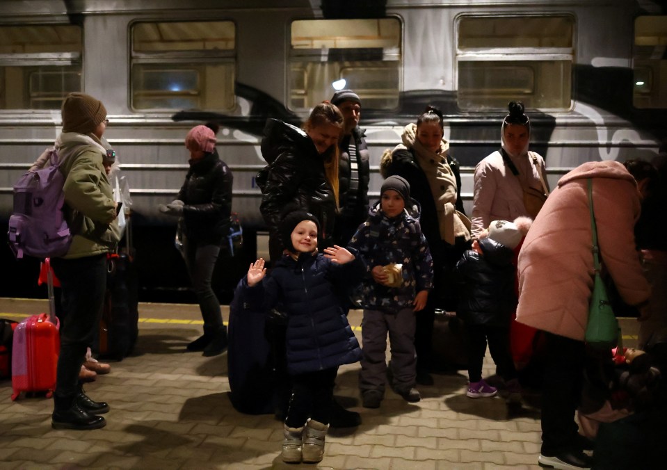 Traipsing in the cold with haunted eyes and hungry bellies, thousands pass through the station in Lviv in western Ukraine every day