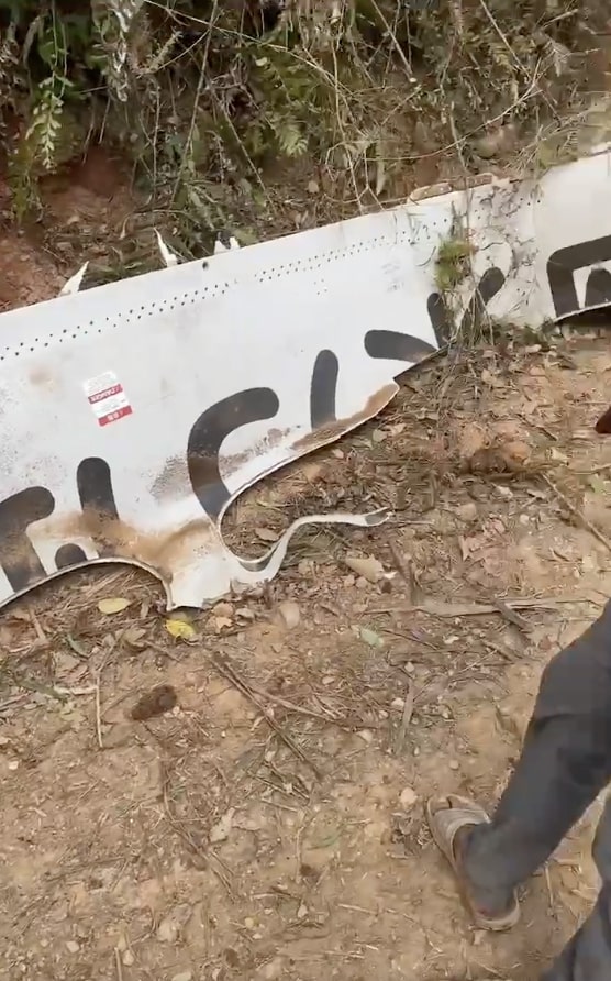 Pieces of the plane can be on the ground after the crash in Guangxi, China