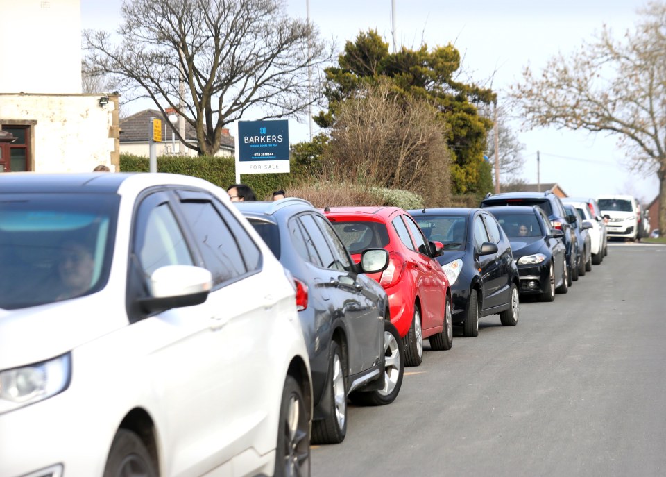 Some parents got to the school an hour before pick up to grab some of the only parking spaces available