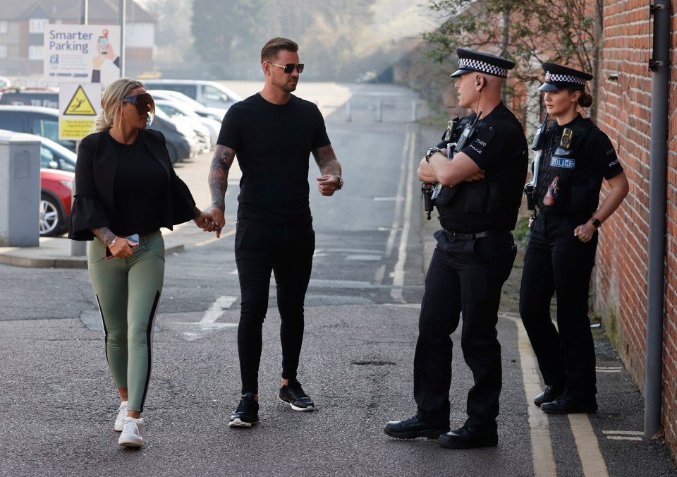 Carl and Katie walked hand-in-hand as they chatted to two officers before the hearing