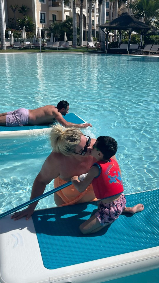 The TOWIE alumni is on holiday with fiance Rami and his son Tristan