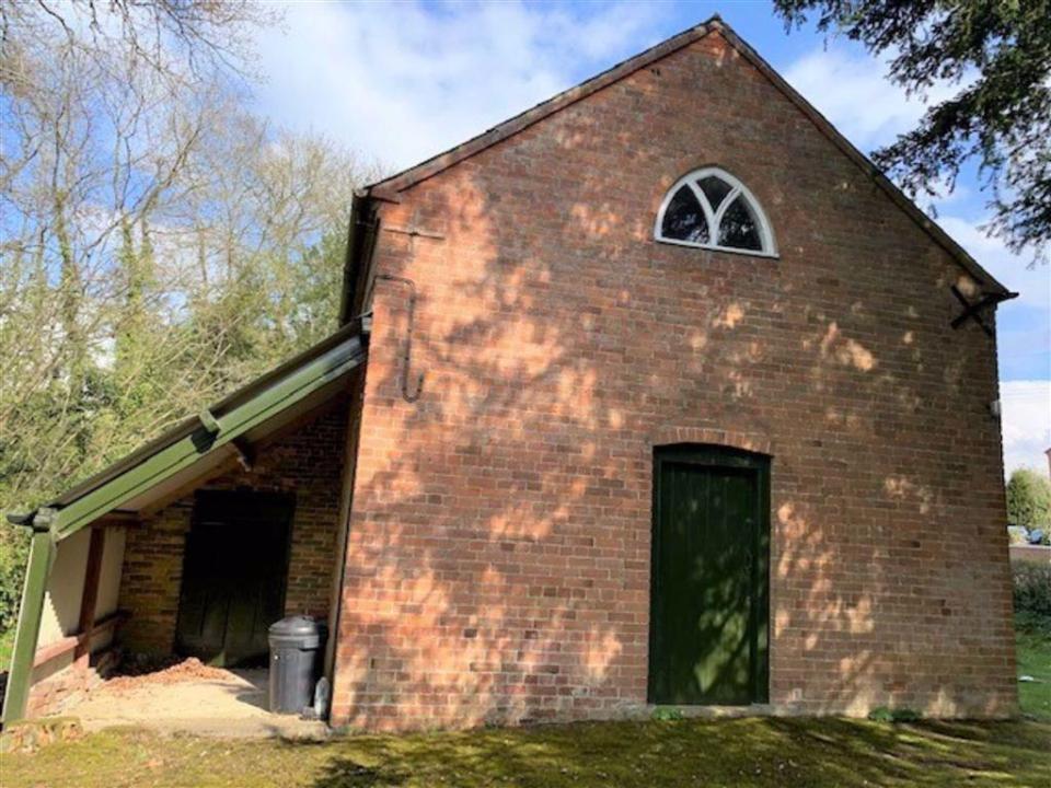 The property boasts a timber and brick shed