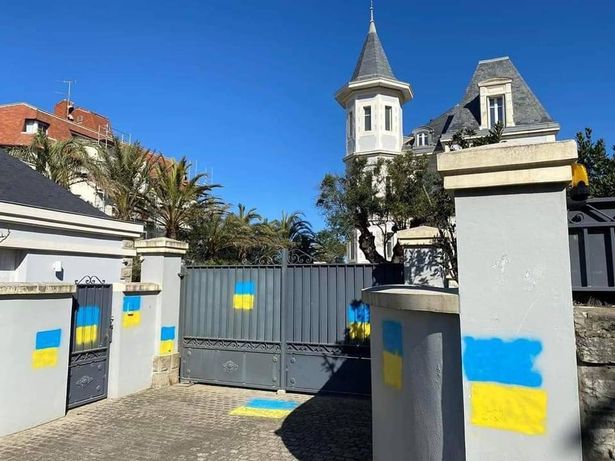 The entrance to the holiday bolthole in southern France was daubed in the colours of the Ukraine flag