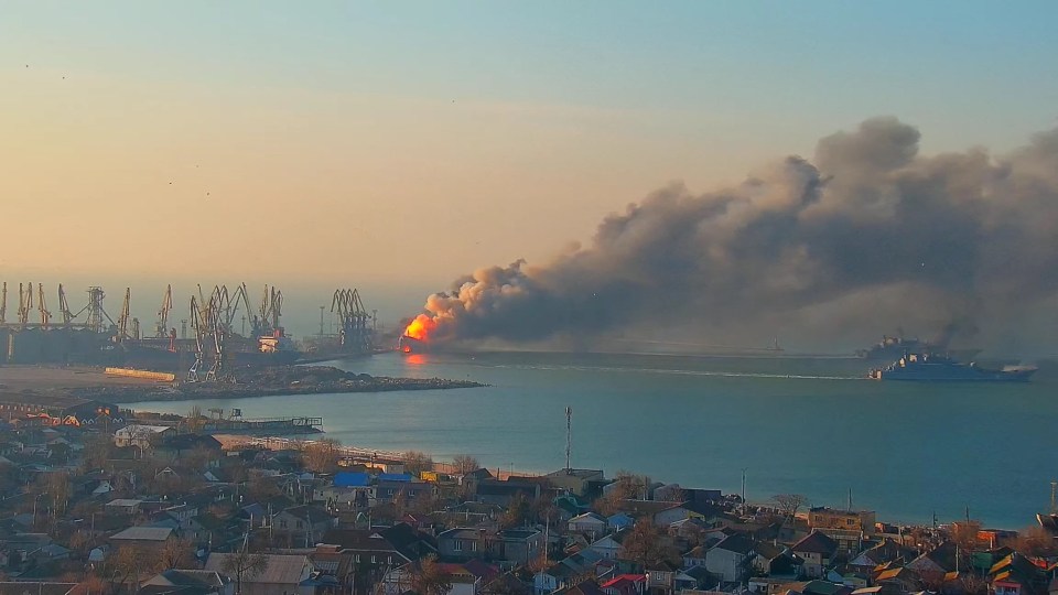 Smoke billows from a Russian ship at the port of Berdiansk