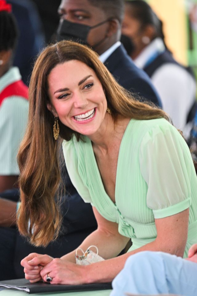 The Duchess grinned at the schoolchildren during the assembly