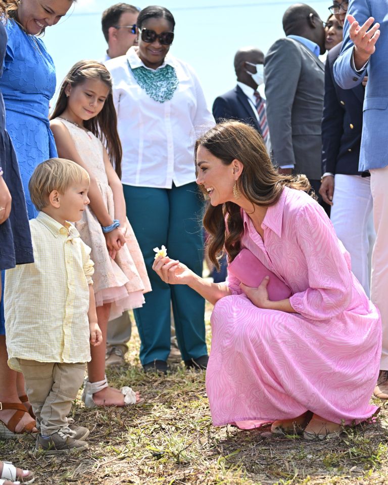 Wills and Kate learned how communities were still being rebuilt two years on from the hurricane - and the duchess had a chat with one of her smallest fans