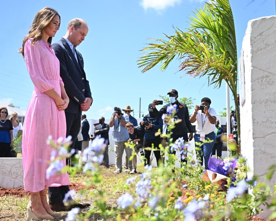 Prince William and Kate Middleton bowed their heads as they paid tribute to the victims of a violent hurricane today