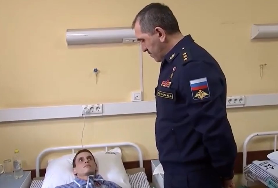 Deputy Russian defence minister Yunus-Bek Yevkurov towered over the young man