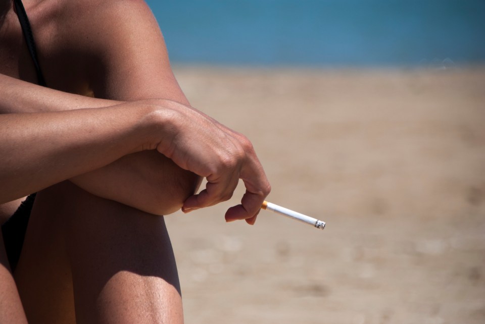 There are five surprising Spanish laws that you could easily break while you're on your hols - including smoking on the beach