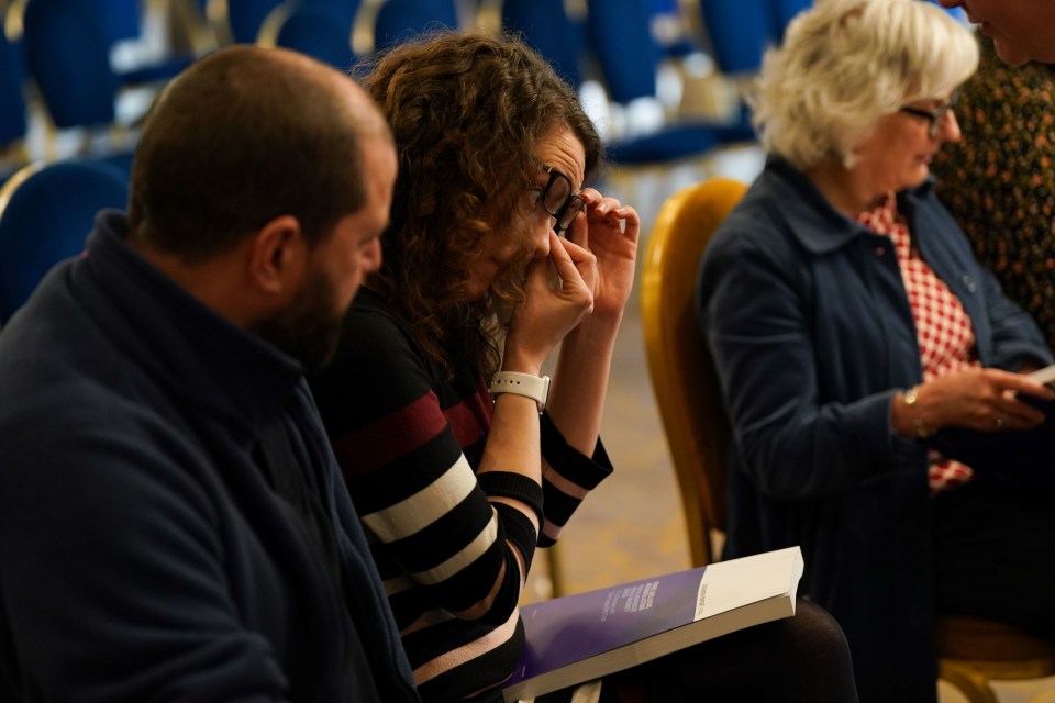 Kayleigh tearfully looking at the finished report yesterday