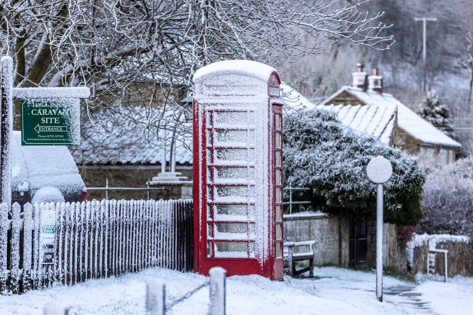 Villagers in Hutton Le Hole, Yorkshire, after heavy snow fall this morning