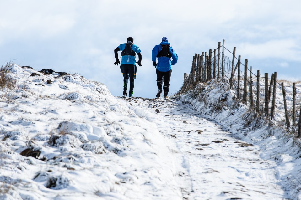 Fell runners braved the chill on part of the Pennine Way on Saddleworth Moor near Oldham today