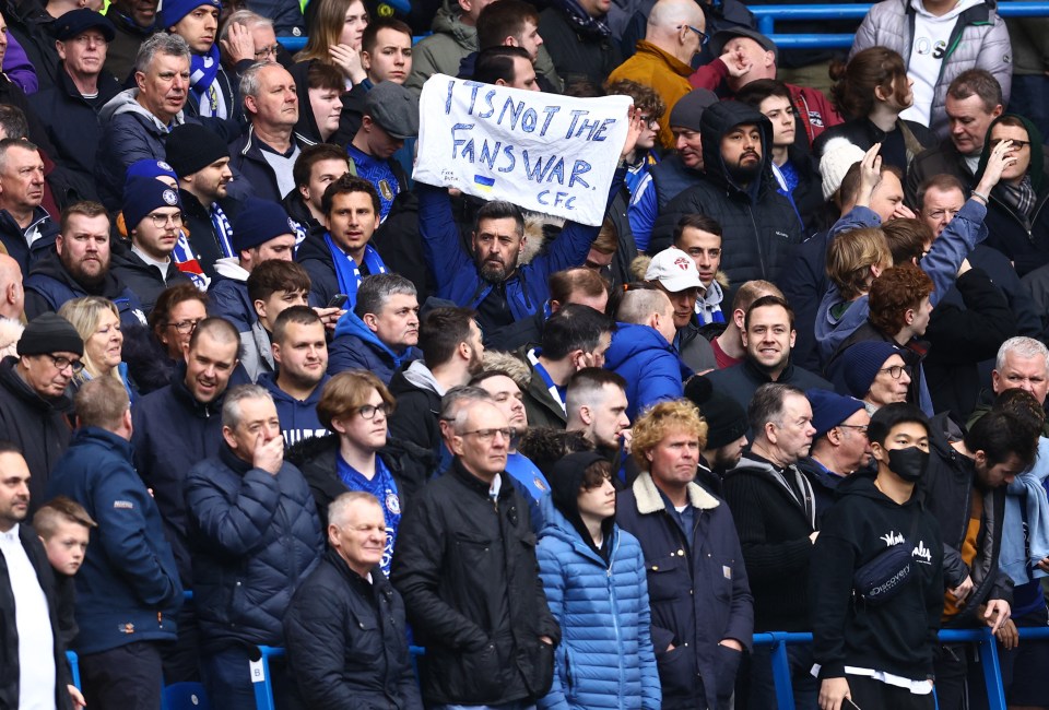 Fans held up their signs inside Stamford Bridge