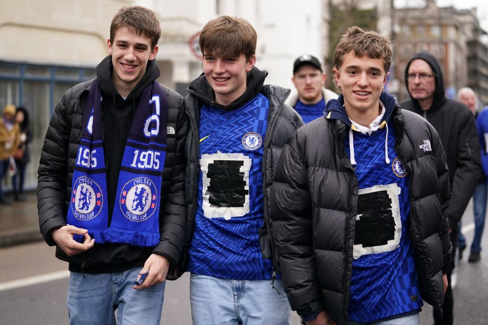 Fans covered up Three's logo on the front of the shirt