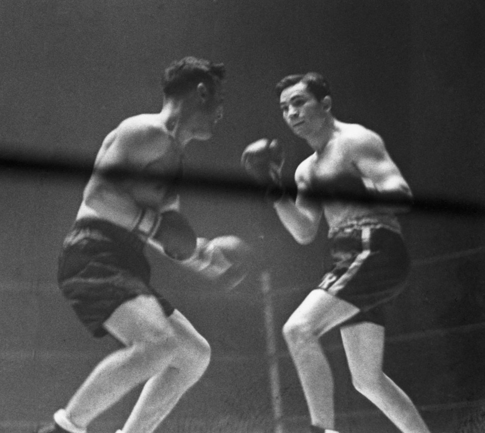 Barney Ross, right, was world champion at lightweight and light-welterweight