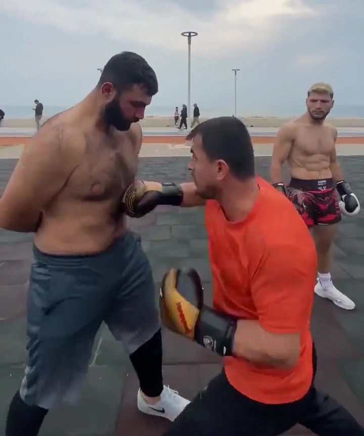 A boxing trainer unleashed shots on defenceless fighters