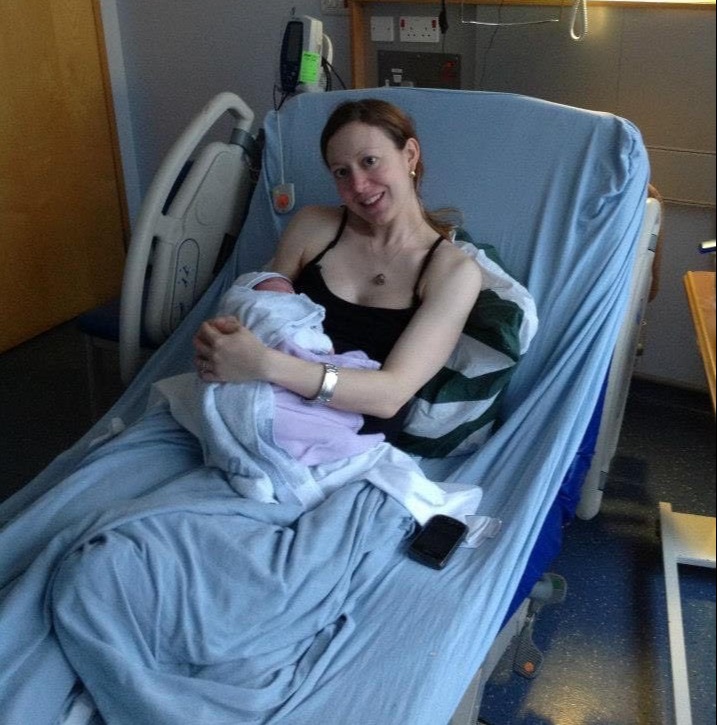 Still in the hospital after the birth of her second born