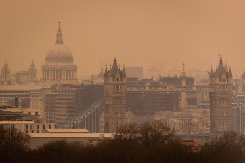 The city of London was tinted by orange this afternoon